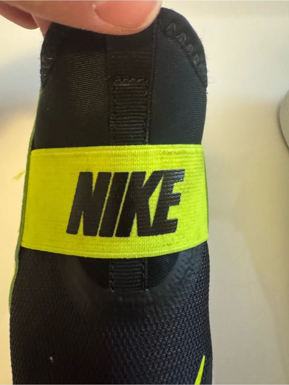 Nike Kids Slip-On Sneakers in Black and Volt